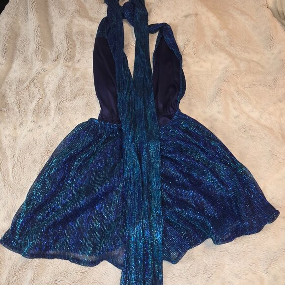 Blue shimmery romper with long tie down the back. - Picture 5 of 6
